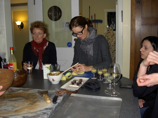 Fruit! See, it's good for ya! Janet slices apples for the caramel apple bites. 